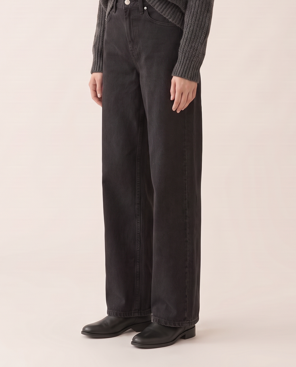Black wide-leg jeans, waist-down view