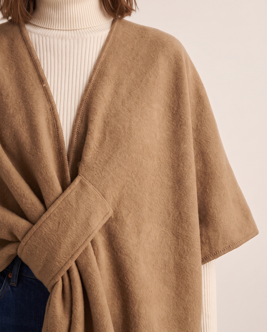Women's Fleece Shawl Wrap — close-up of the slip-through loop and stitched edge