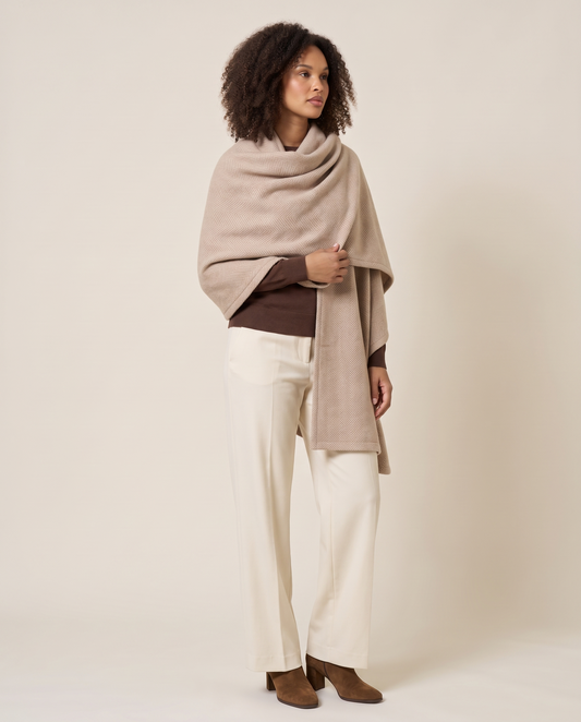 Women's Herringbone Blanket Shawl in Wheat, three-quarter view, wrapped over the shoulders