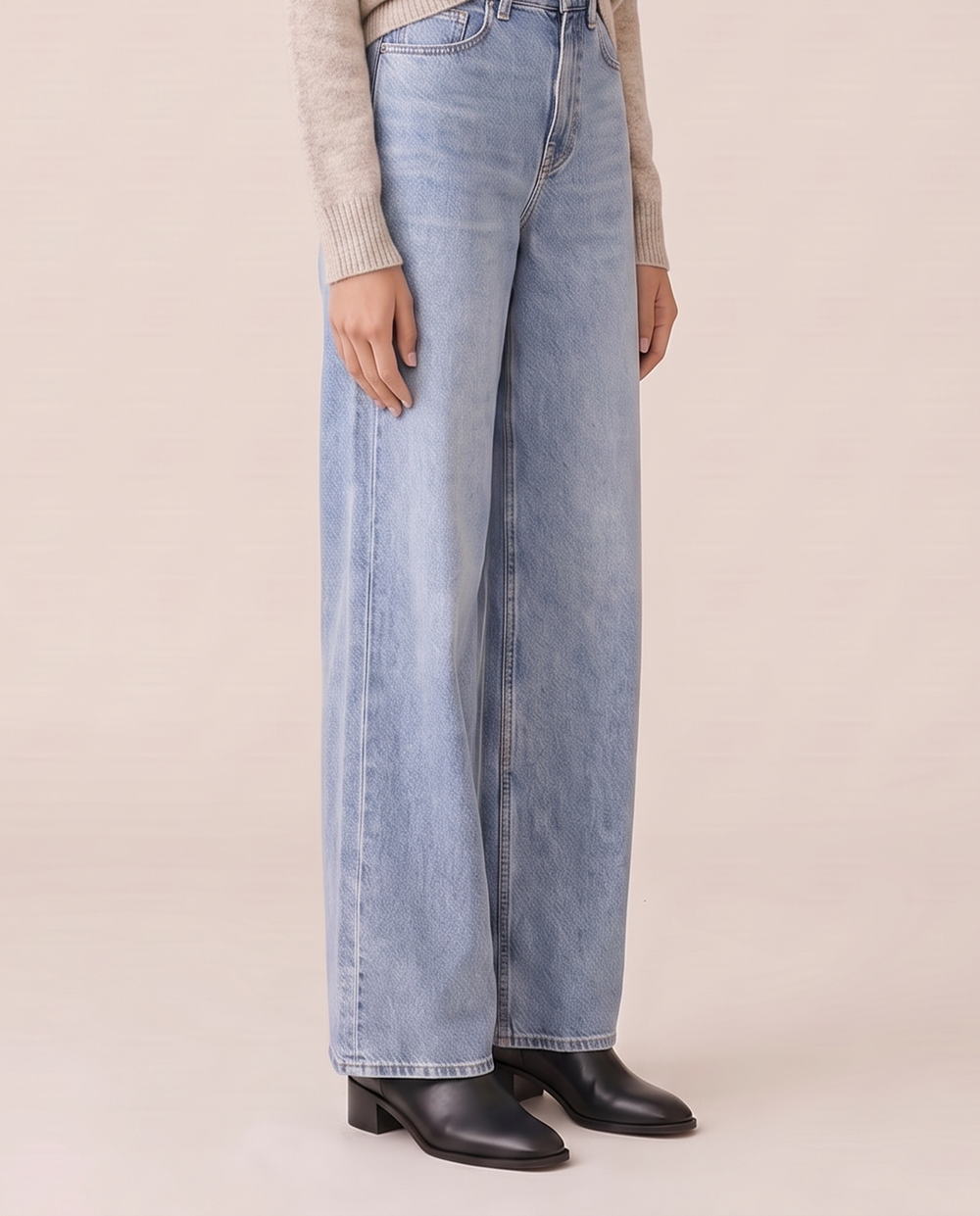 Baggy flare jeans, waist-down view