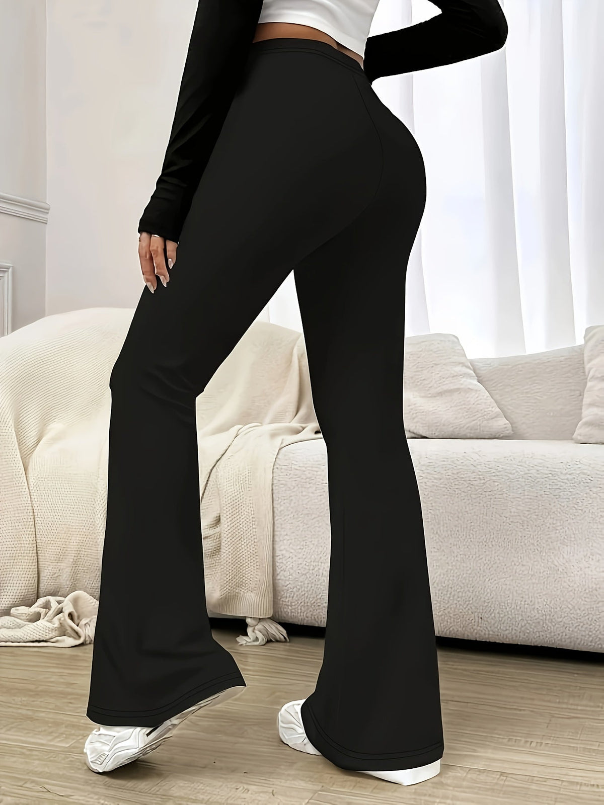 Women's Black High-Waisted Stretch Flare Pants, view 2