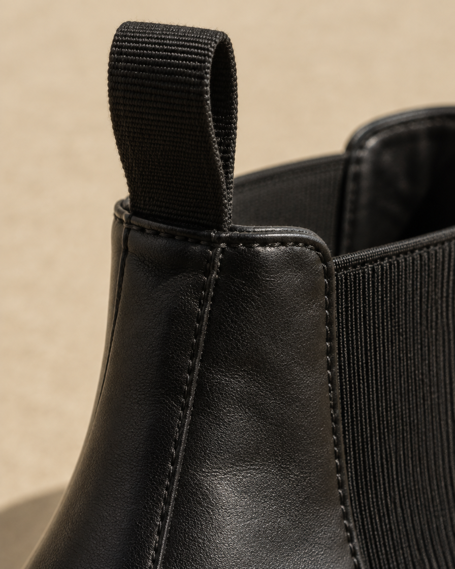 Lug Sole Chelsea Boots with Front and Back Pull Tabs — pull tab detail