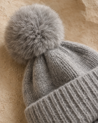 ONORA Gardenia Chic Cashmere Beanie with Pom-Pom — pom-pom and cashmere knit detail