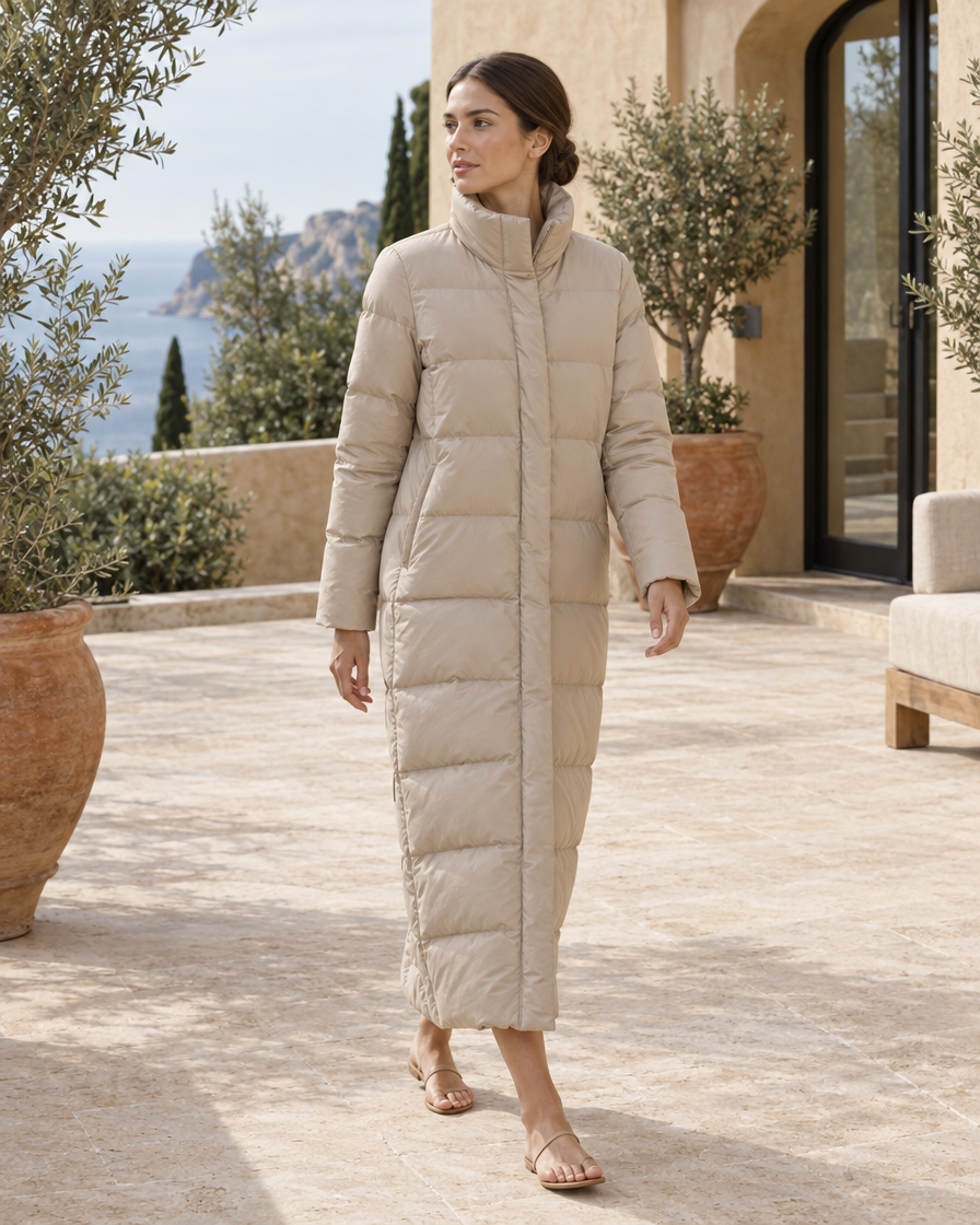ONORA Winslow Full-Length Quilted Puffer Coat — worn on a villa terrace