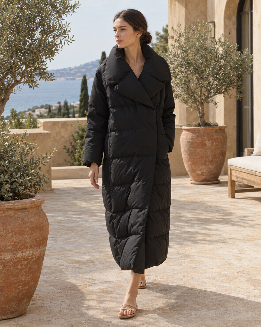 ONORA Brackley Oversized-Collar Long Puffer Coat — worn on a villa terrace