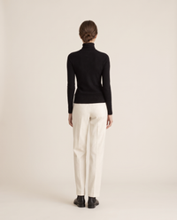 Merano Classic Solid Knit Turtleneck Sweater — studio back