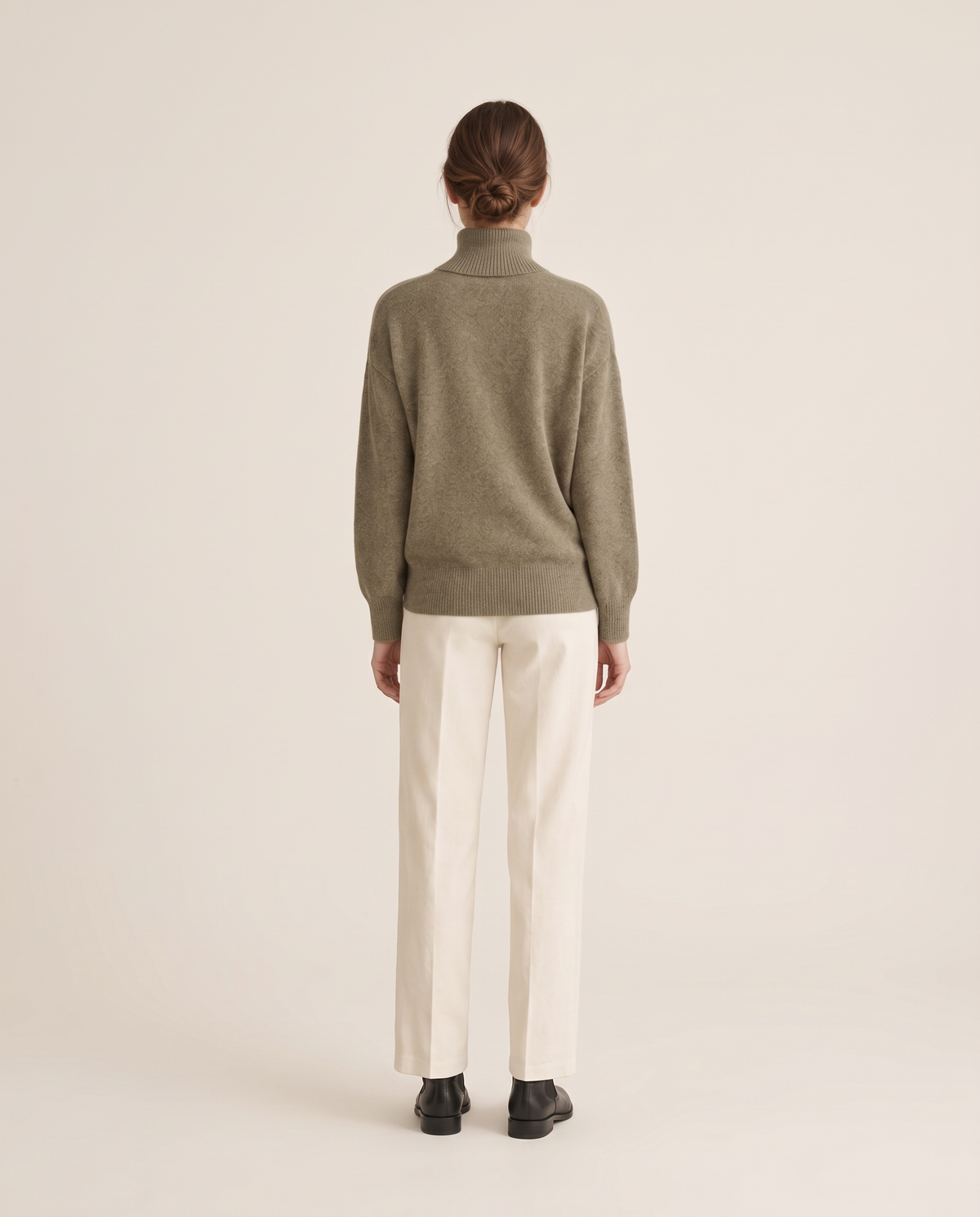 Erice Relaxed Loose-Fit Fine Knit Turtleneck Sweater — studio back