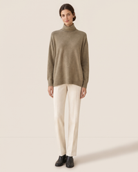 Erice Relaxed Loose-Fit Fine Knit Turtleneck Sweater — studio front