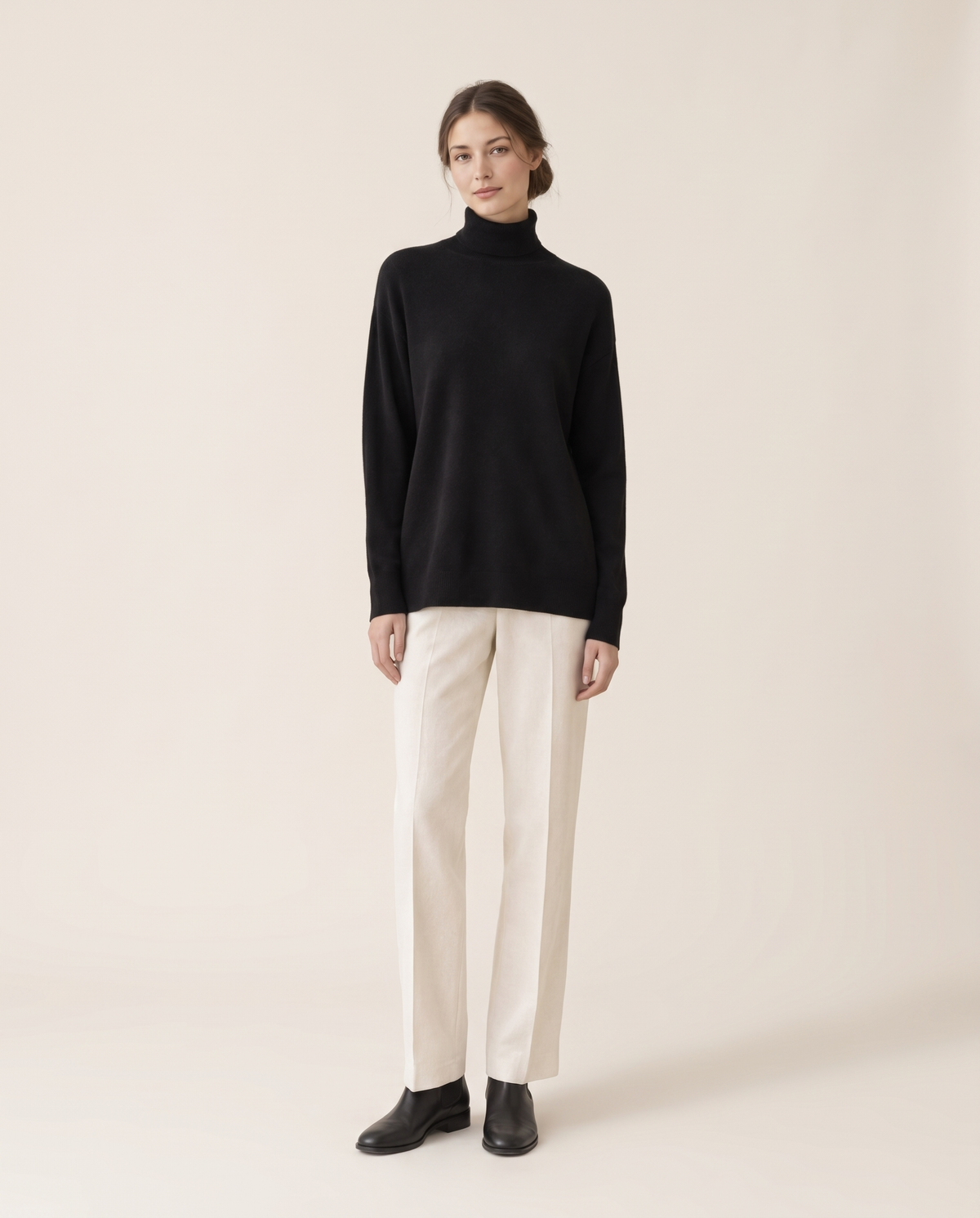 Erice Relaxed Loose-Fit Fine Knit Turtleneck Sweater — black, studio front