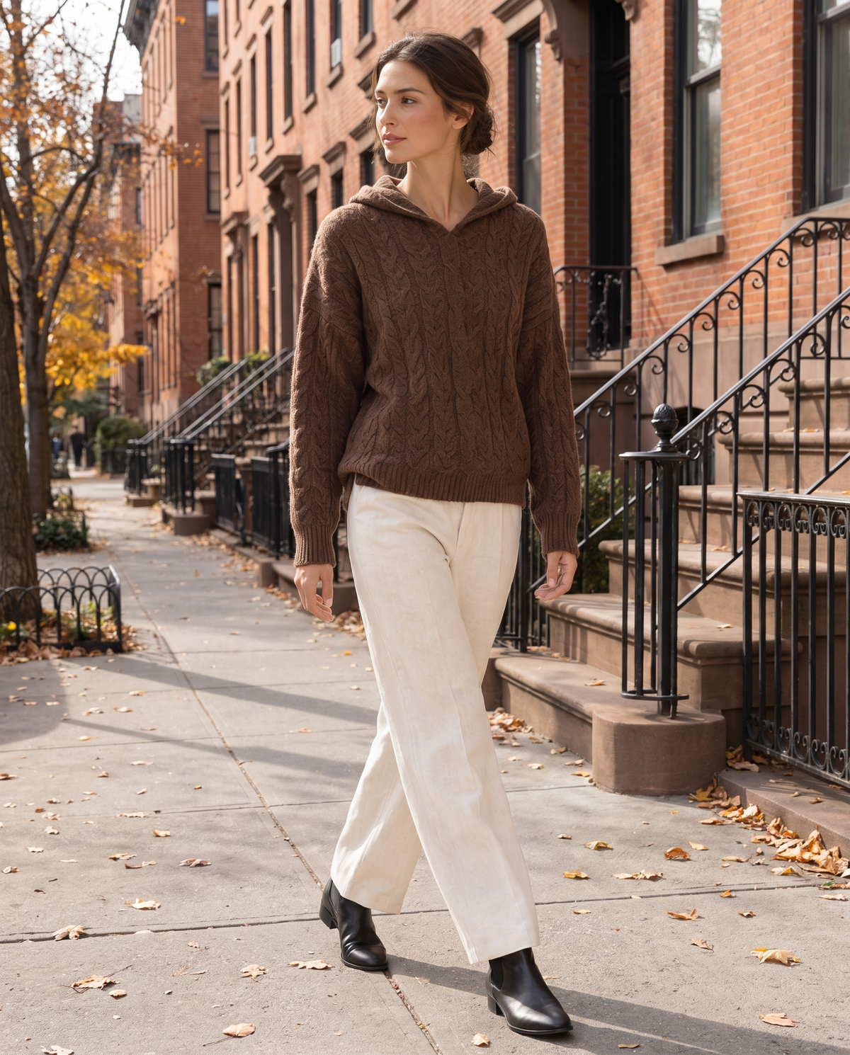 Marzamemi Cozy Hooded Cable Knit Pullover Sweater — worn on a New York street in autumn