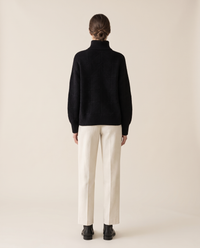 Thornbury Warm Ribbed-Cuff Geometric Knit Turtleneck Sweater — studio back