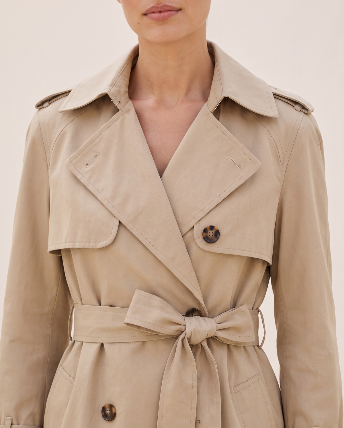 Classic Double-Breasted Belted Trench Coat — storm flap and epaulettes, worn