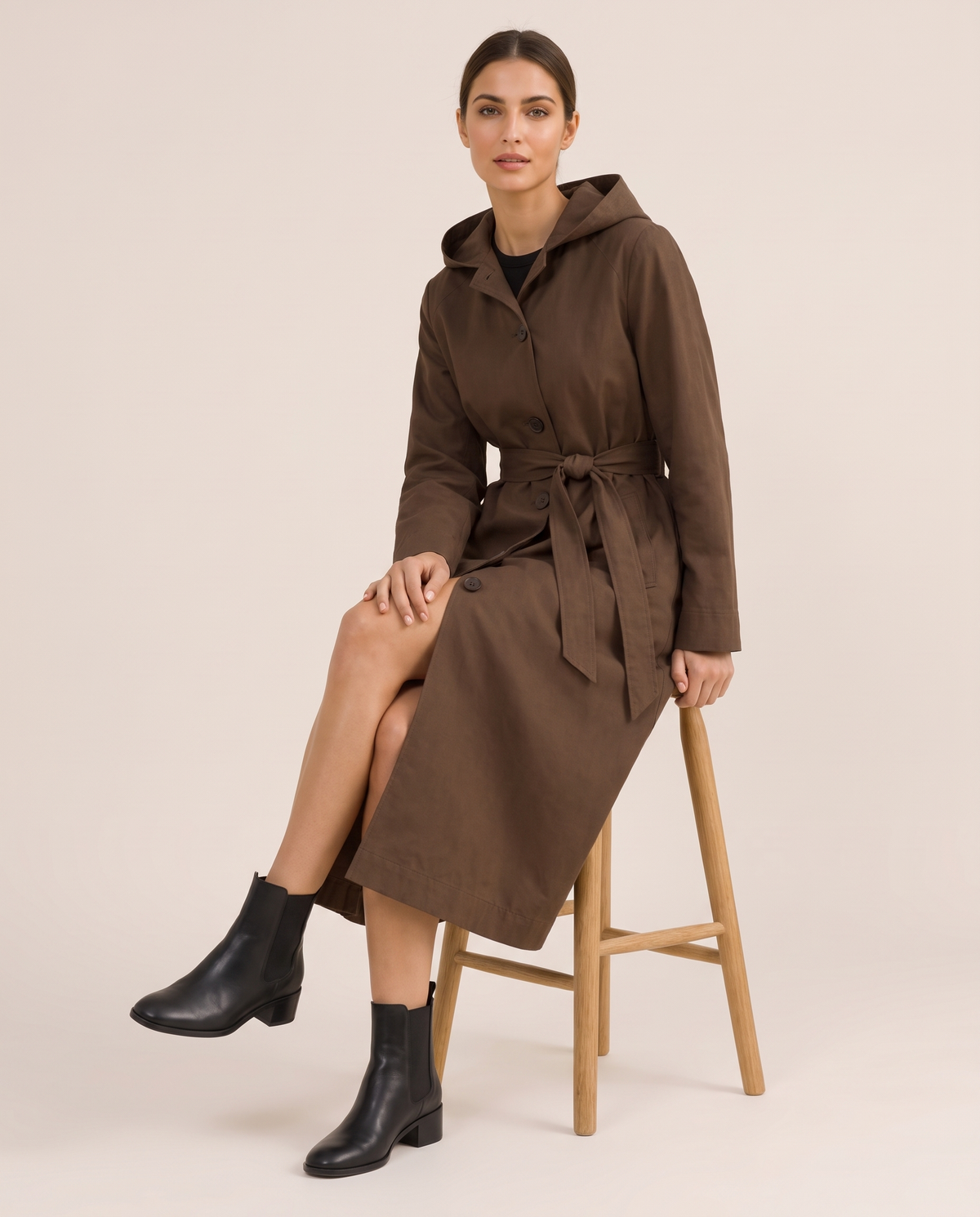 Hooded Single-Breasted Trench Coat — worn seated