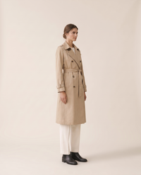 Mid-Length Double-Breasted Belted Trench Coat — three-quarter view
