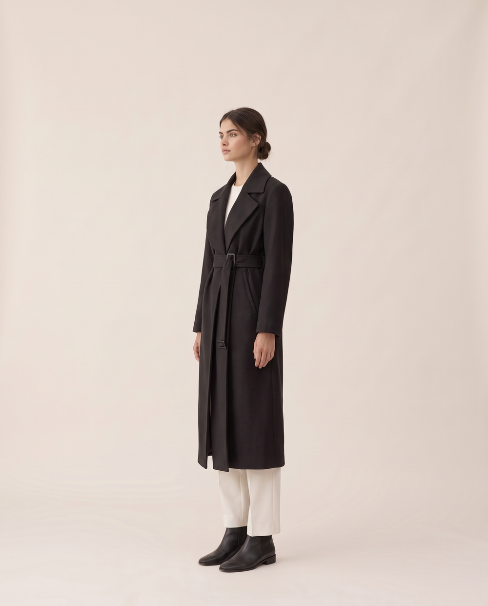 Black Longline Trench Coat with Wide Lapels — three-quarter view