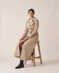 Belted Maxi Trench Coat for Women — worn seated