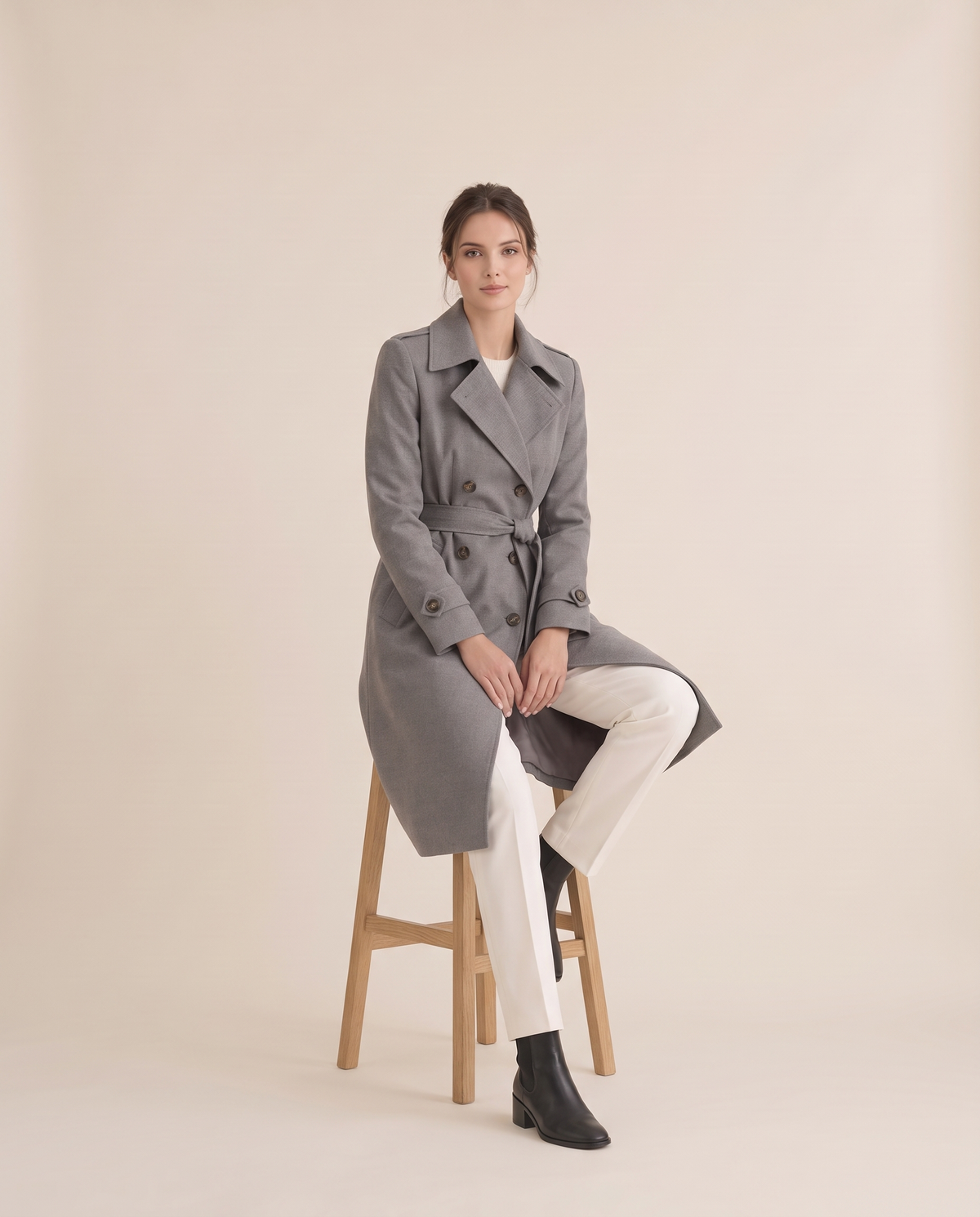 Women's Double-Breasted Trench Coat — worn seated