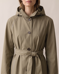 Waterproof Hooded Trench Coat for Women — button front and hood, worn