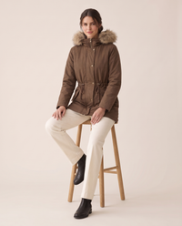 Faux Fur Trim Drawstring Parka — worn seated