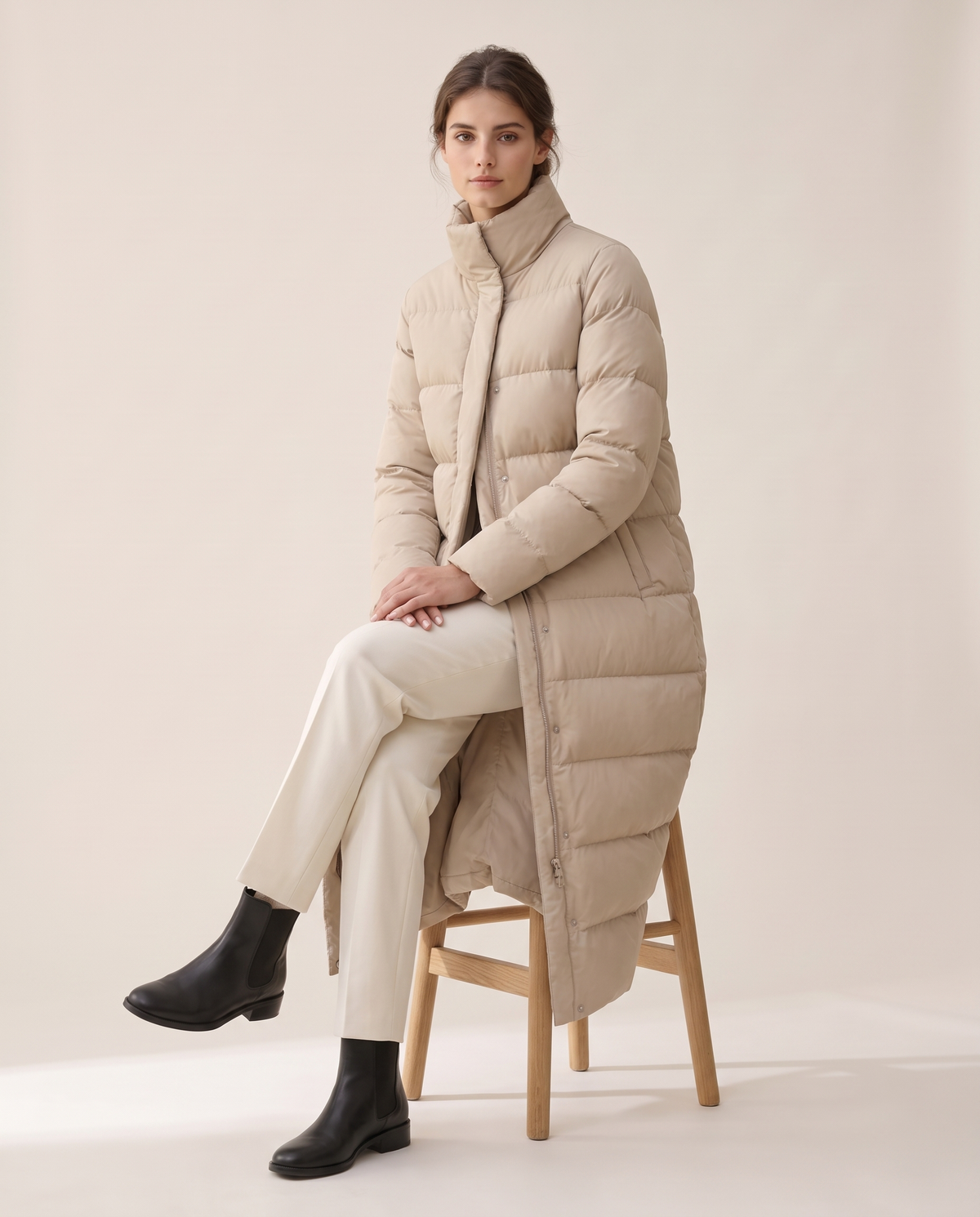 Full-Length Quilted Puffer Coat with Stand Collar — worn seated