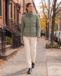 Tailored Quilted Puffer Jacket with High Neck — worn on a New York street in autumn