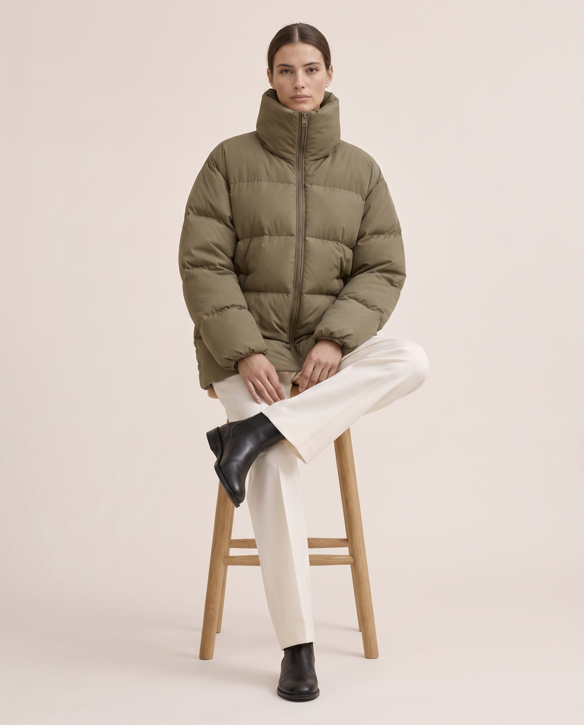 Oversized Quilted Puffer Jacket with Funnel Neck — worn seated