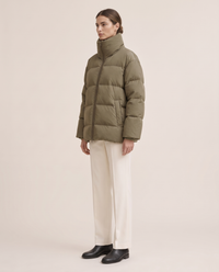 Oversized Quilted Puffer Jacket with Funnel Neck — three-quarter view