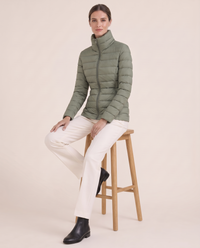 Tailored Quilted Puffer Jacket with High Neck — worn seated