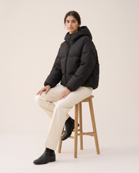 Oversized Hooded Puffer Jacket for Women — worn seated