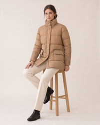 Lightweight Duck Down Puffer Coat — worn seated