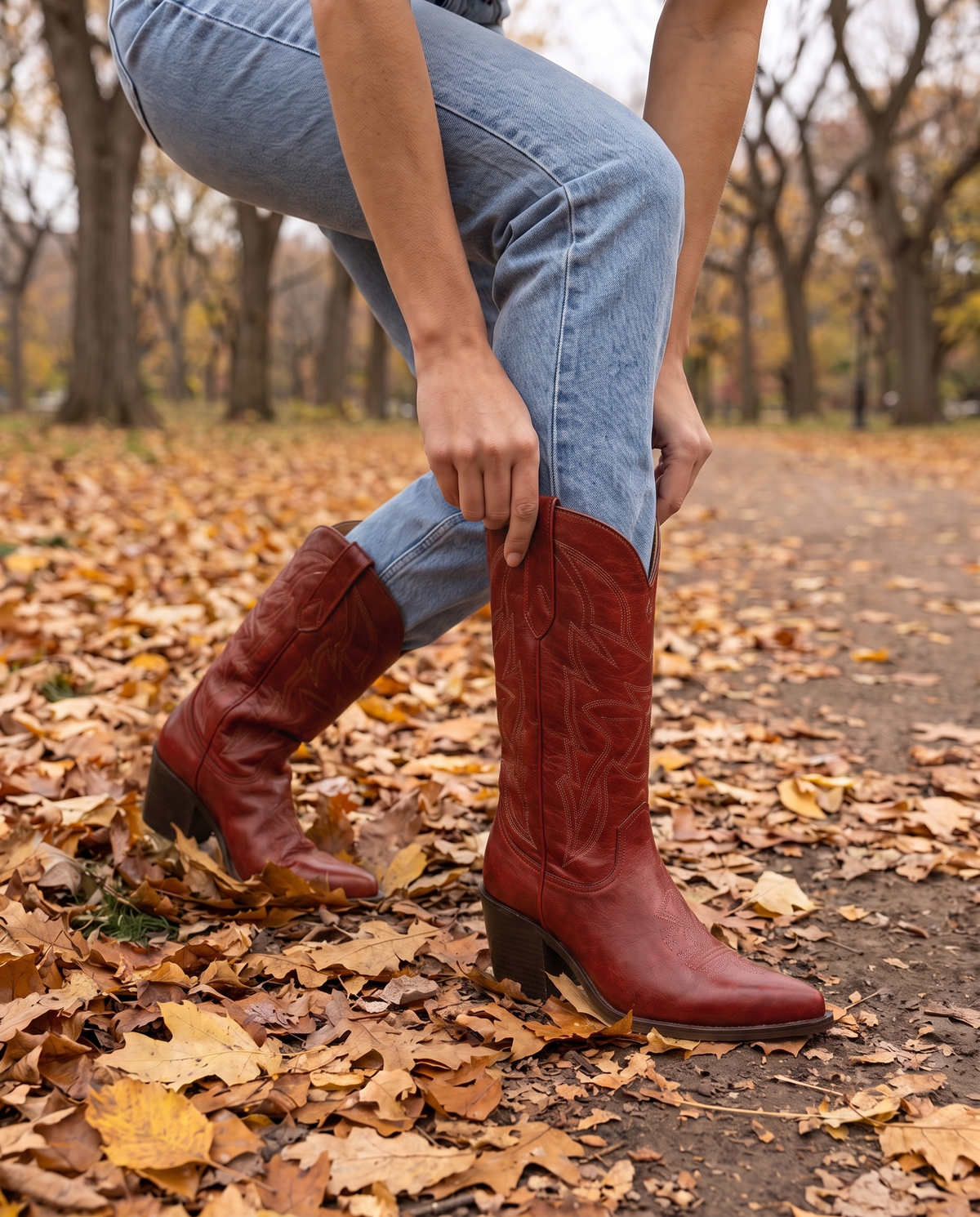 Red Cowboy Boots for Women, Mid-Calf Western Style — worn with jeans in Central Park