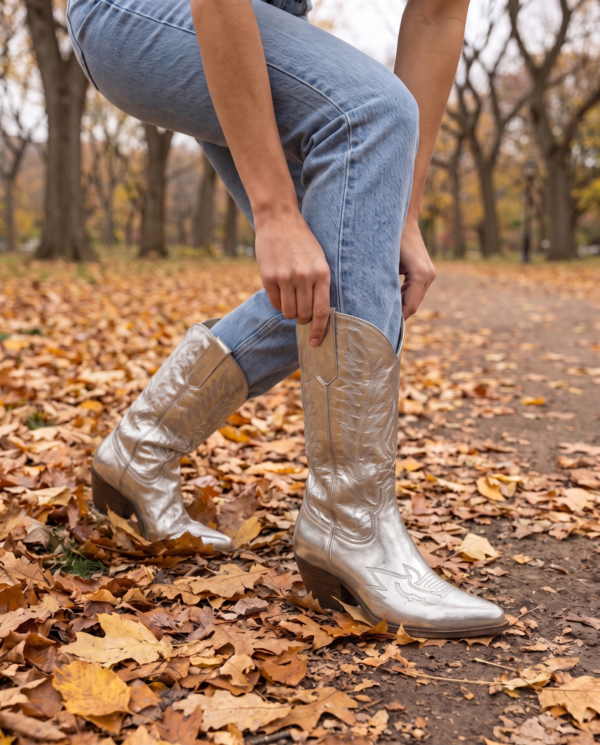 Silver Metallic Cowboy Boots, Mid-Calf — worn with jeans in Central Park