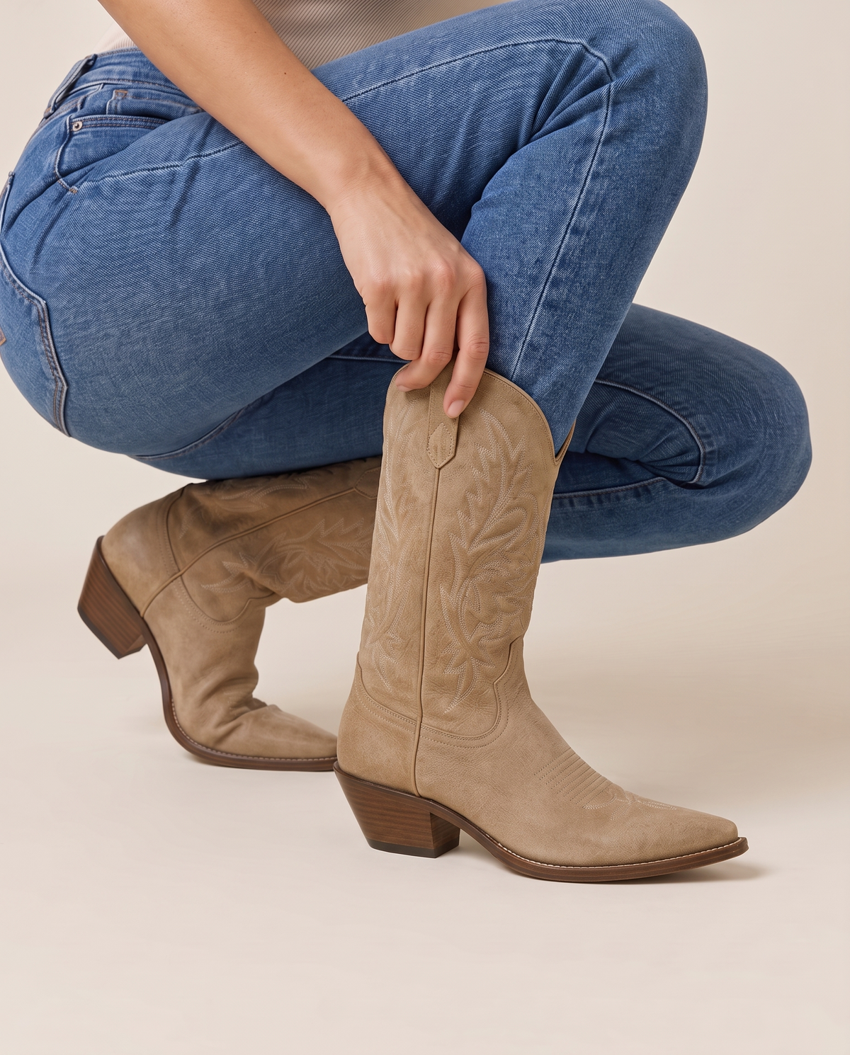 Comfort Western Boots with Cushioned Footbed — pulling on the boot with jeans