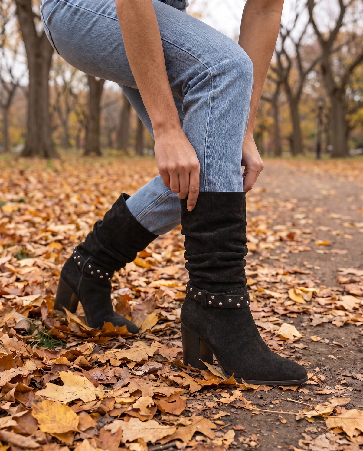 Slouchy Suede Mid-Calf Boots with Stud Strap — worn with jeans in Central Park
