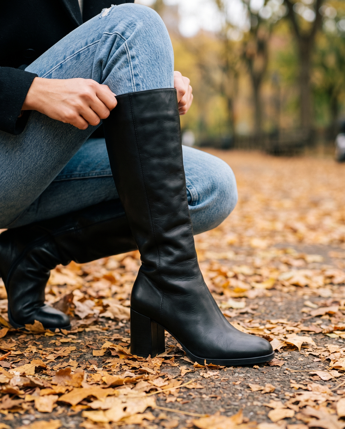Round Toe Knee-High Boots with Block Heel — worn with jeans in Central Park