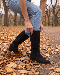 Knee-High Boots with Cushioned Footbed and Side Zipper — worn with jeans in Central Park