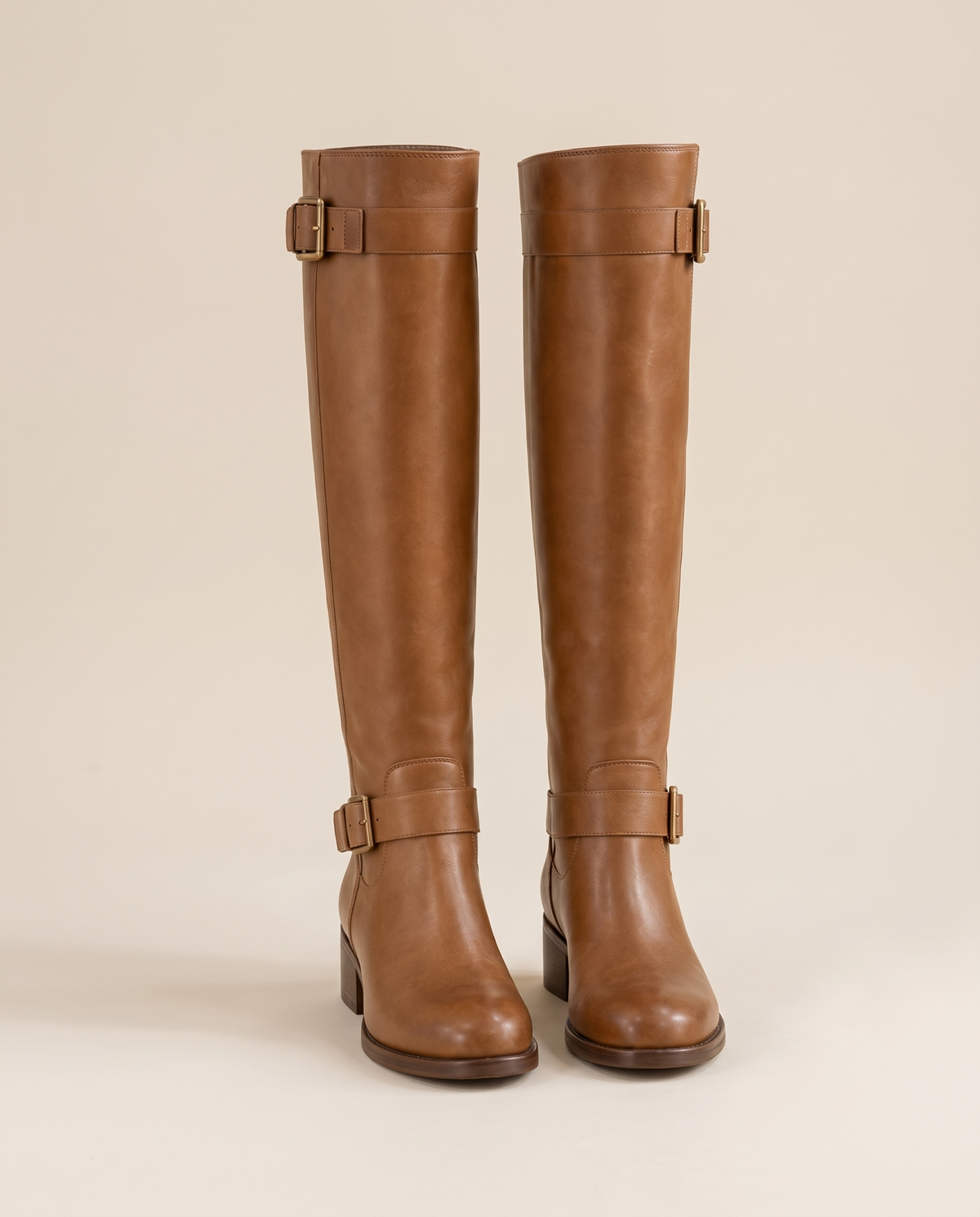 Knee-High Riding Boots with Buckle Straps and Low Block Heel — brown, pair, studio