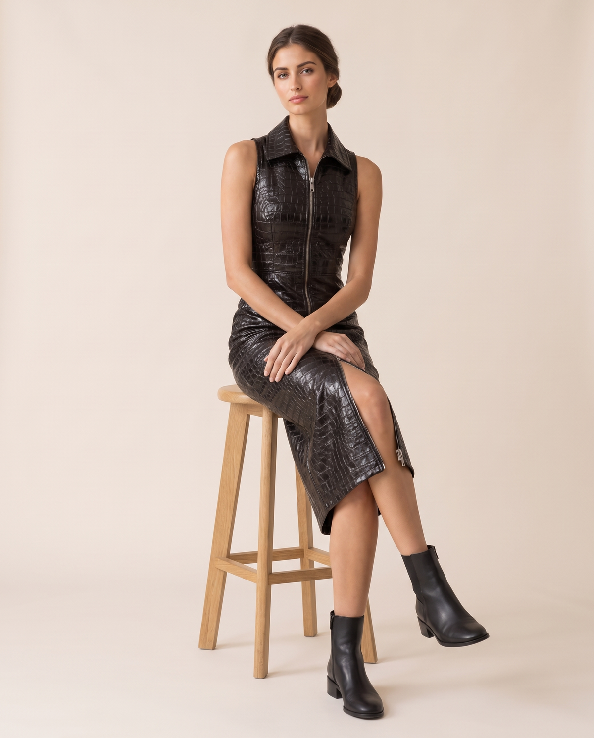 Ravenwood Sleek Croc-Embossed Zip-Front Midi Dress — worn seated