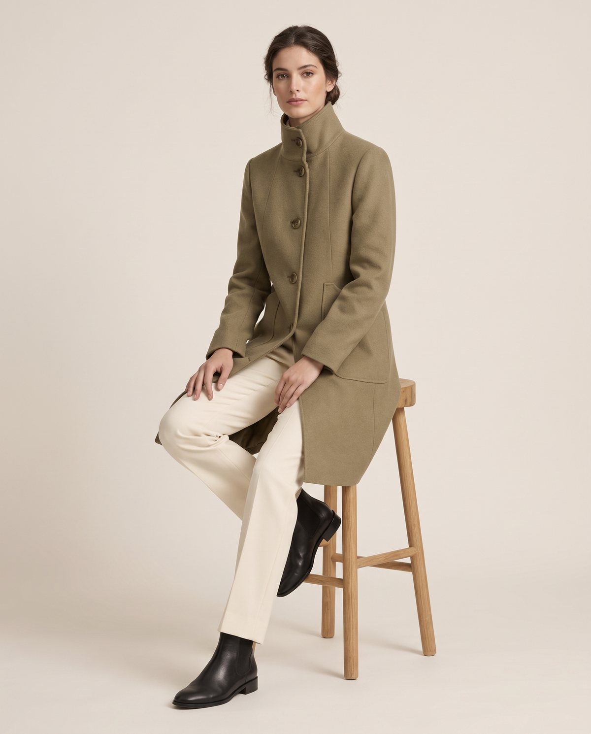 Women's Stand-Collar Coat with Deep Pockets — worn seated
