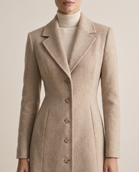 Long Tailored Coat with Flared Hem — lapels and fitted waist, worn
