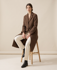 Straight-Cut Button-Front Coat for Women — worn seated