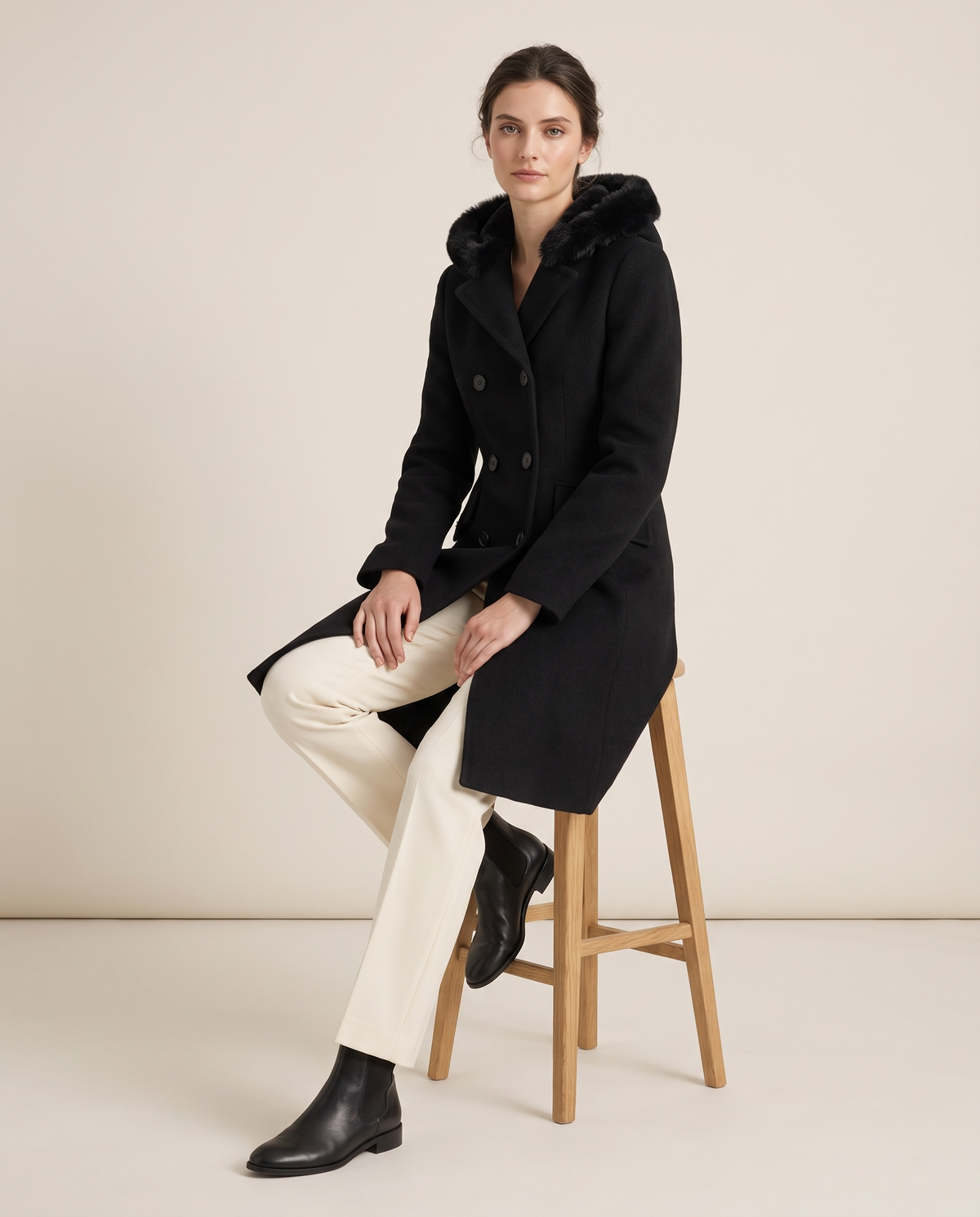 Double-Breasted Hooded Coat with Plush Trim — worn seated