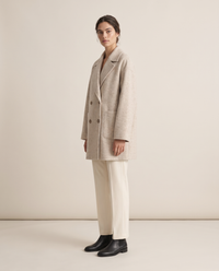 Oversized Double-Breasted Wool-Blend Coat — three-quarter view