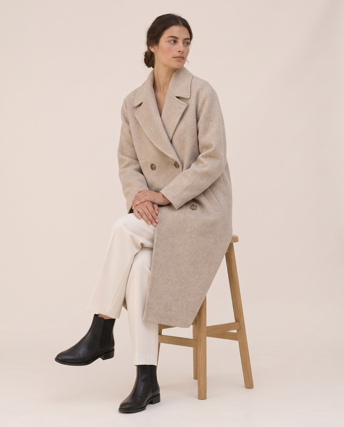 Long Double-Breasted Overcoat for Women — worn seated