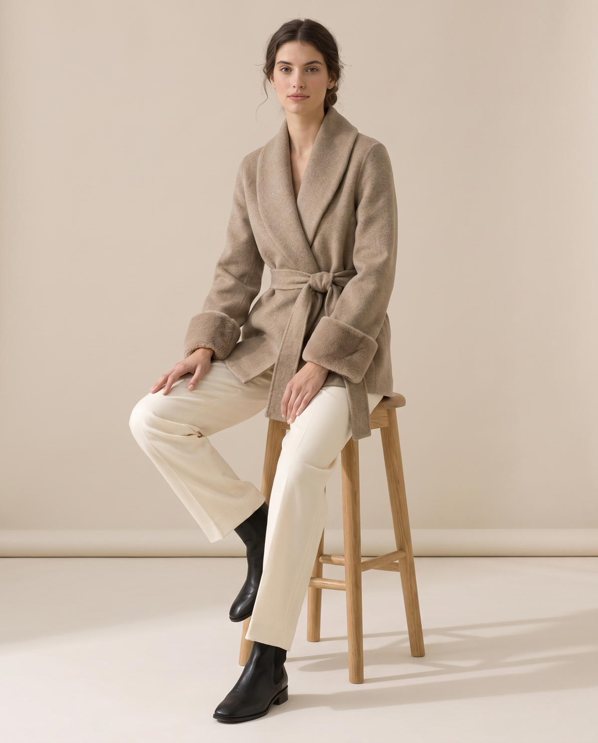 Wool-Blend Wrap Coat with Plush Cuffs — worn seated