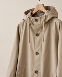 Oversized Hooded Raincoat for Women — on hanger