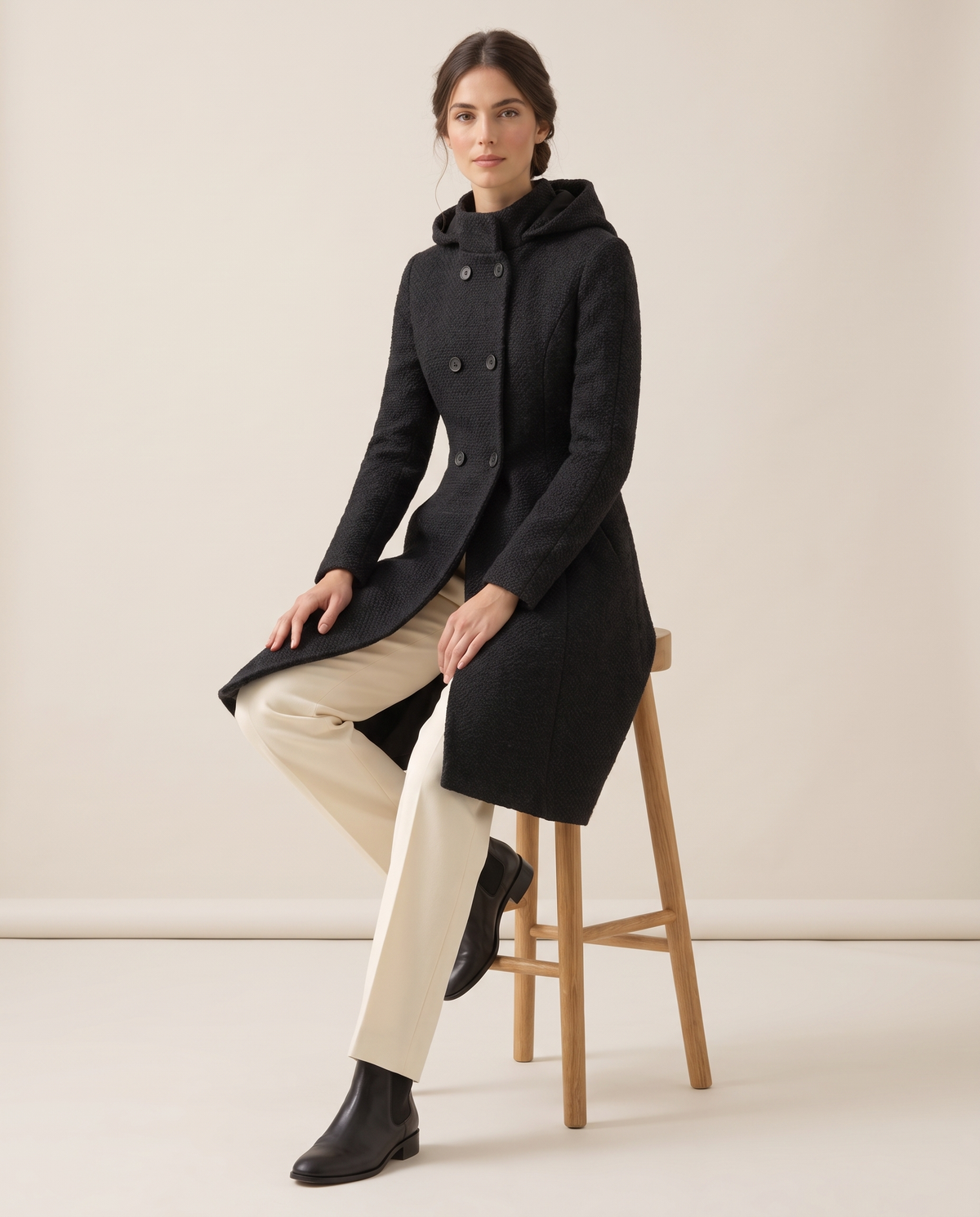 Fitted Hooded Coat with Textured Finish — worn seated