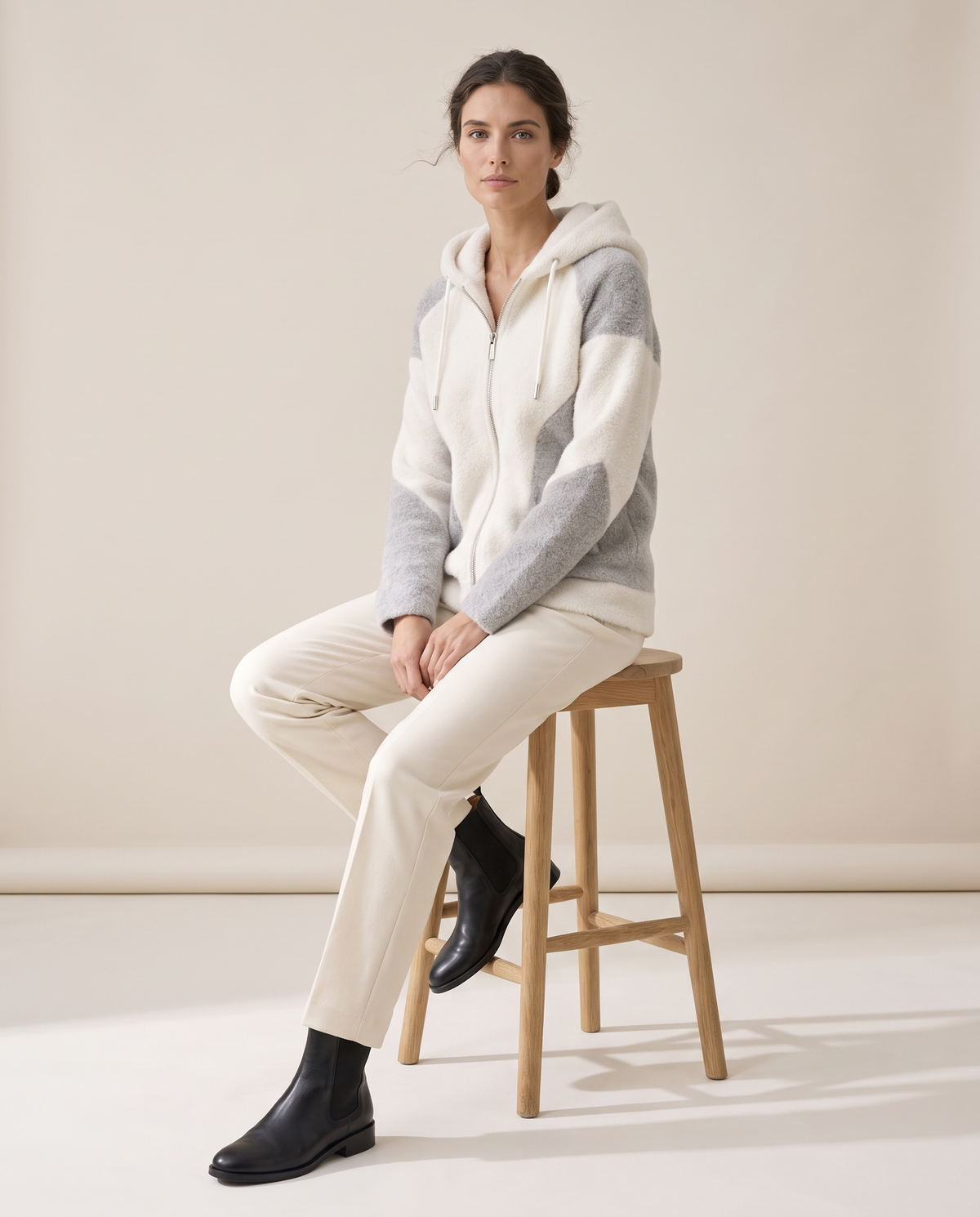 Color-Block Plush Hooded Jacket — worn seated
