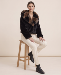 Patchwork Faux Fur Coat or Vest with Hood — worn seated