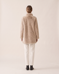 Faux Fur Coat with Quilted Lining — studio back